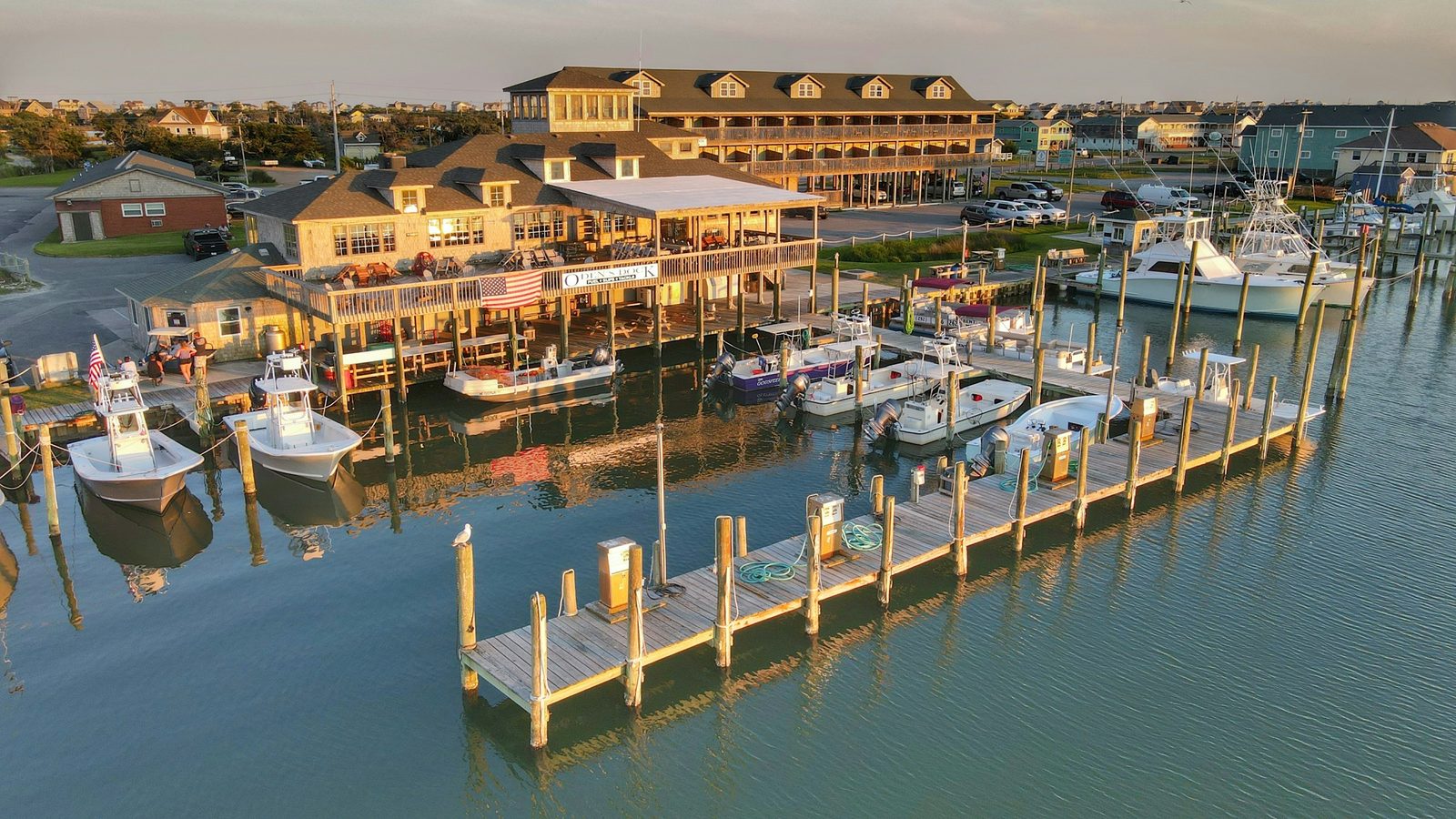 Charter boats docked at the Oregon Inlet Fishing Center on the Outer Banks at sunrise